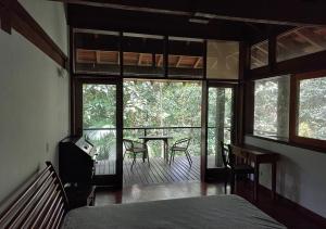 Postel nebo postele na pokoji v ubytování Casa da Floresta Barra do Una - Litoral Norte