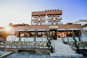 a building with stairs in front of it at Zlatna Kruna in Banja Luka