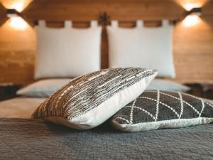 A bed or beds in a room at Apartment L'Envers