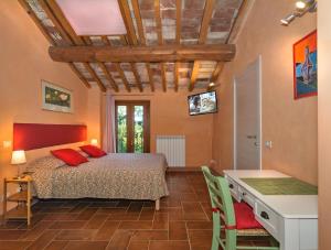 Postel nebo postele na pokoji v ubytování Dolce Vita in Tuscany B&B