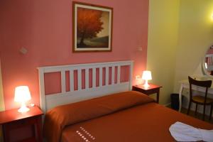 Letto o letti in una camera di Albergo Umbria