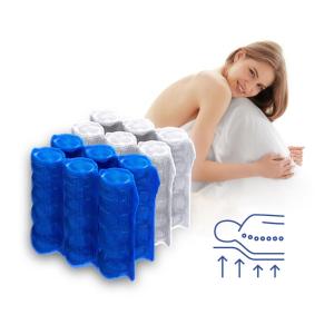 a woman laying next to a pile of water bottles at Hotel Berliner Hof in Düsseldorf