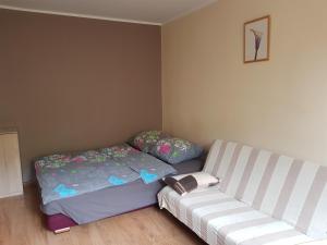 Posteľ alebo postele v izbe v ubytovaní Apartament na Przymorzu