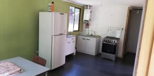 A cozinha ou cozinha compacta de Cabañas El Toro - Radal Siete Tazas