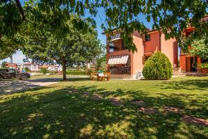 Vonkajšia záhrada v ubytovaní Apartment Marcella