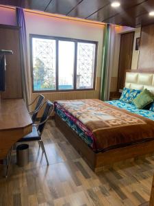 Postel nebo postele na pokoji v ubytování Valley crown B&B