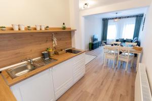 Η κουζίνα ή μικρή κουζίνα στο MyApartment