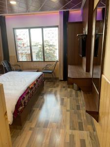 Postel nebo postele na pokoji v ubytování Valley crown B&B