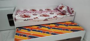 A bed or beds in a room at Tertels beach resort hurghada F 2-6 Még 21 kép