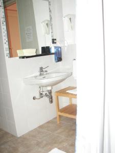 Koupelna v ubytování Albergo Sangrilà