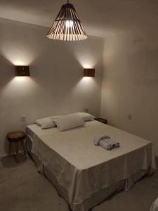 En eller flere senge i et værelse på Hospedaria Passos do Mar, Caraíva