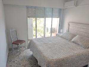 Ένα ή περισσότερα κρεβάτια σε δωμάτιο στο Apartamento en alquiler punta del este 3 dormitorios