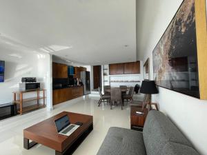 Η κουζίνα ή μικρή κουζίνα στο INCREIBLE DEPARTAMENTO A PIE DE PLAYA EN MANZANILLO, COMPLETAMENTE NUEVO