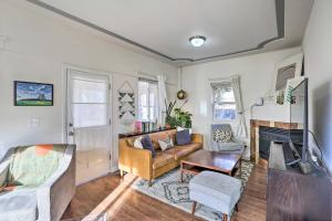 a living room with a couch and a fireplace at 1/2 Mi to Tennyson: Pet-Friendly Denver Gem in Denver