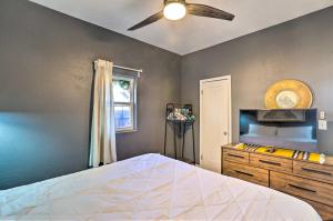 a bedroom with a bed and a ceiling fan at 1/2 Mi to Tennyson: Pet-Friendly Denver Gem in Denver