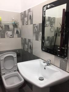 Koupelna v ubytování New Toropi Homestay + 37 fotografií