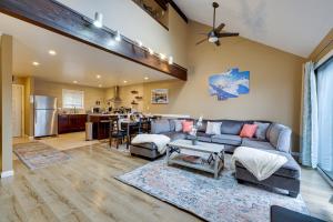 a living room with a couch and a table at Pocono Paradise 143, NEW 4bd, Tannersville, Camelback, Kalahari in Tannersville