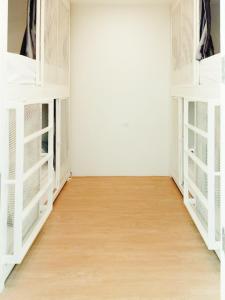 Ein Bett oder Betten in einem Zimmer der Unterkunft Paknap Hostel
