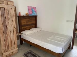 Voodi või voodid majutusasutuse Jippie The Villa toas