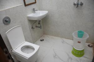 Ванная комната в GURU KRIPA GARDEN