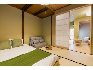 Ένα ή περισσότερα κρεβάτια σε δωμάτιο στο 桃月庵 -Togetsuan-