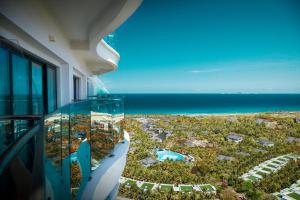 a view of the ocean from a building at Duyen Ha Resort Cam Ranh in Cam Ranh