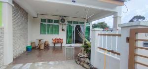 a view of a patio of a house at Homestay De'69 in Jitra