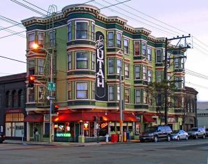 a large building on the corner of a street at The Utah Inn in San Francisco