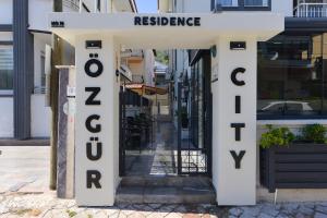 a entrance to a store with a sign that reads isolation at Ozgur City Residence in Fethiye