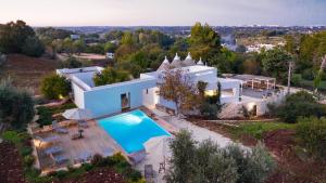 The swimming pool at or close to TRULLO SANTA PAZIENZA 6&3, Emma Villas