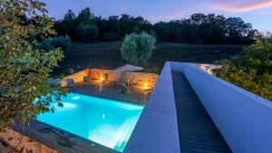 The swimming pool at or close to TRULLO SANTA PAZIENZA 6&3, Emma Villas