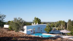 The swimming pool at or close to TRULLO SANTA PAZIENZA 6&3, Emma Villas