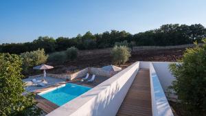 The swimming pool at or close to TRULLO SANTA PAZIENZA 6&3, Emma Villas