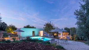 The swimming pool at or close to TRULLO SANTA PAZIENZA 6&3, Emma Villas