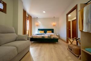 Ένα ή περισσότερα κρεβάτια σε δωμάτιο στο Dùplex Casa de las Argollas Grand Suite Parking gratis