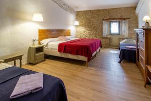 Posteľ alebo postele v izbe v ubytovaní MASÍA CAN GRAU habitaciones con desayuno inlcuido