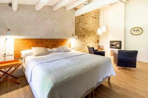 Posteľ alebo postele v izbe v ubytovaní MASÍA CAN GRAU habitaciones con desayuno inlcuido