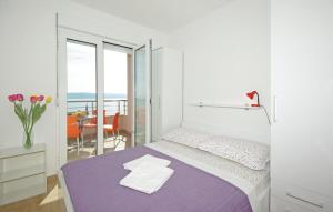 Posteľ alebo postele v izbe v ubytovaní Apartmani Mila Brela