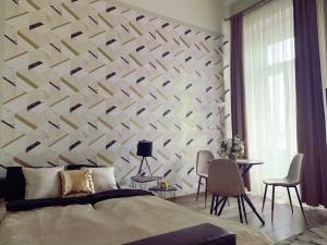 Posteľ alebo postele v izbe v ubytovaní Marble