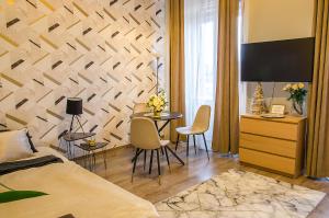 Posteľ alebo postele v izbe v ubytovaní Marble