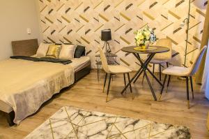 Posteľ alebo postele v izbe v ubytovaní Marble