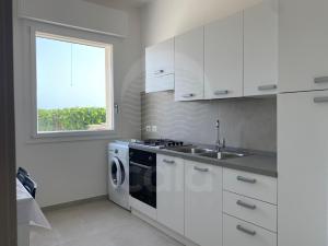 Køkken eller tekøkken på La Torre - Piano terra By Cala Salento + 13 billeder