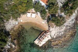 an aerial view of a bridge over the water at Villa Romantica Hotel in Paleo Tsifliki
