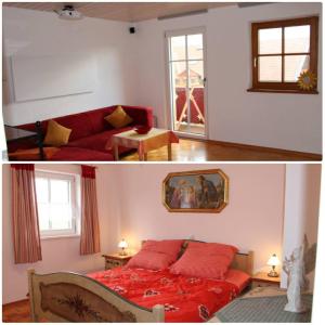 a bedroom with a red bed and a living room at Ferienhaus Wankner in Tittmoning