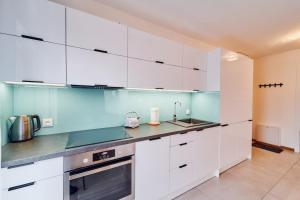 Kuchyňa alebo kuchynka v ubytovaní LAGUNA Apartament Polanica Residence 48
