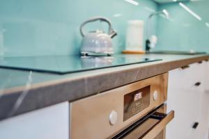 Kuchyňa alebo kuchynka v ubytovaní LAGUNA Apartament Polanica Residence 48