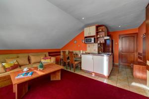 Kuchyň nebo kuchyňský kout v ubytování Apartmánový dom Slniečko