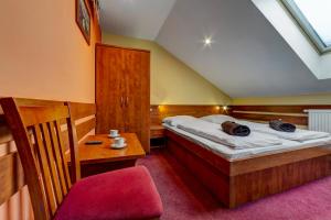 Postel nebo postele na pokoji v ubytování Apartmánový dom Slniečko
