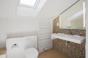 Koupelna v ubytování Gästehaus Prinzregent Luitpold + 30 fotografií