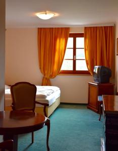 Postel nebo postele na pokoji v ubytování Sport Aktiv Pension Spanner - Tauplitz + 8 fotografií